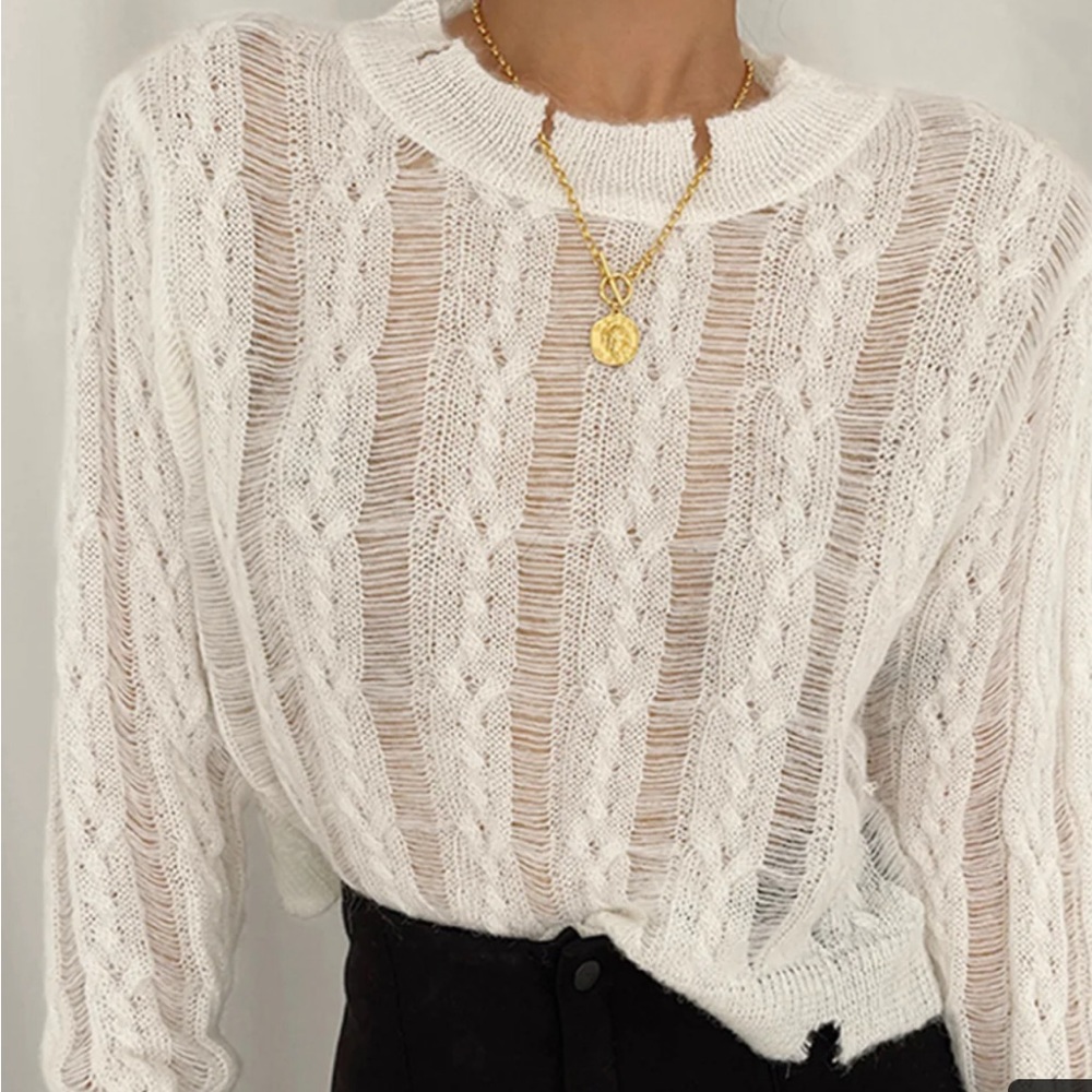 White distressed sweater